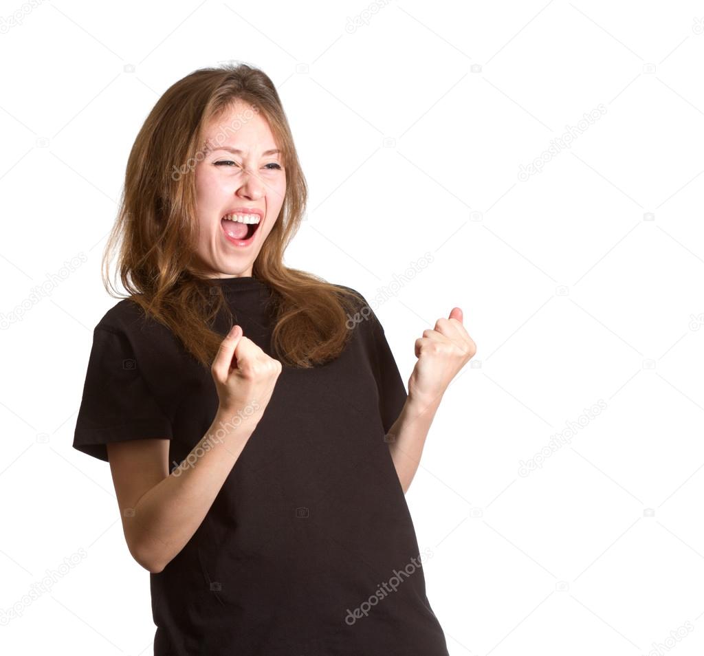 Girl gesturing success isolated white