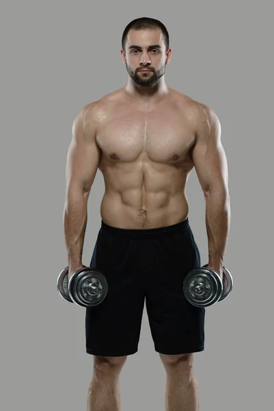Grande exercício. Retrato de fisiculturista profissional muscular — Fotografia de Stock
