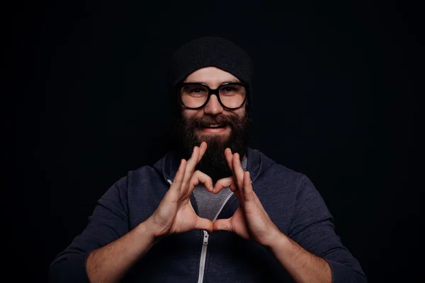 Bonito macho barba grande em óculos e chapéu — Fotografia de Stock