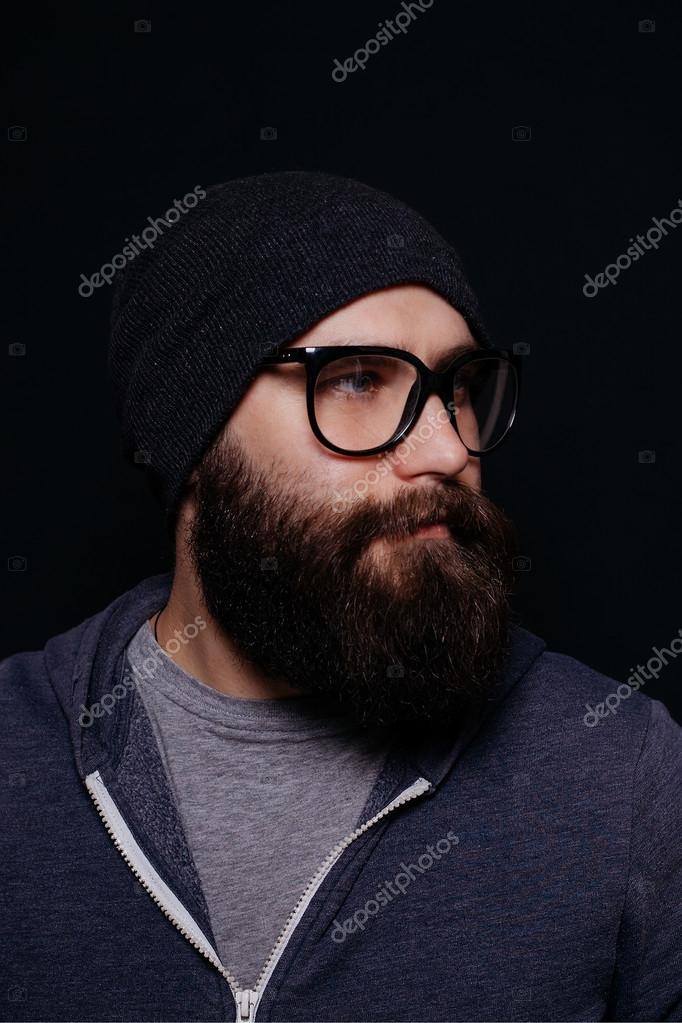 Handsome male big beard in glasses and hat — Stock Photo