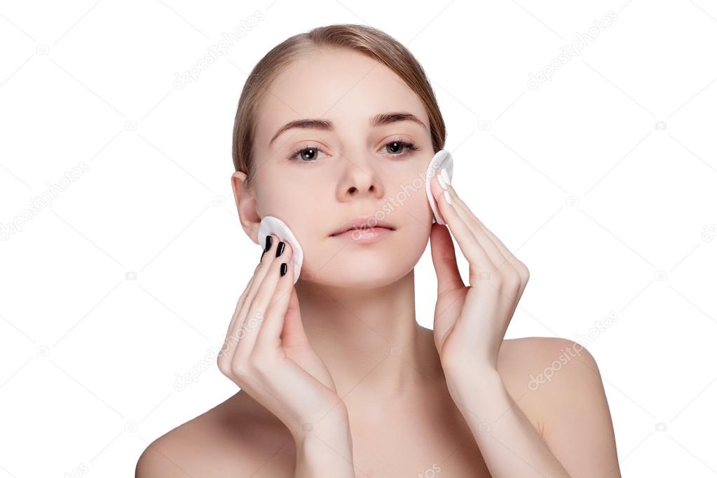 Woman using cotton pad