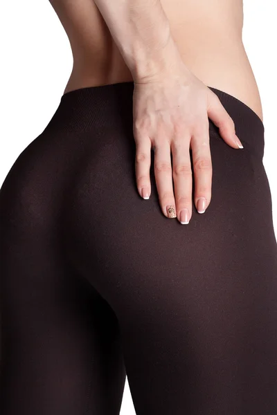 Pretty womens ass in tight tights white background — Stock Photo, Image