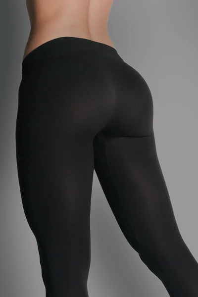 Woman in leggings and sneakers, low section. athletic ass Stock Photo