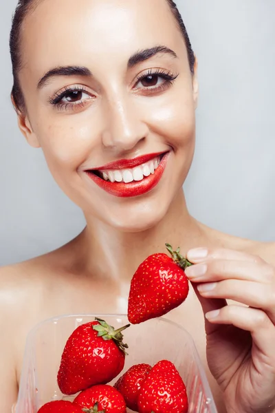 Sexy mujer usando comer fresa . —  Fotos de Stock