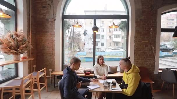 Happy Young Disabled Man Wheelchair Cafe Communicates Friends Diverse Team — Stock Video