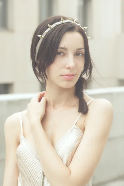 Beautiful woman in beige dress — Stock Photo, Image