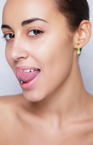 Close up image of female ear with earring — Stock Photo, Image