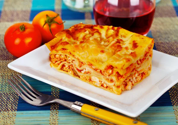 Lasagna plate on a tabletop — Stock Photo, Image