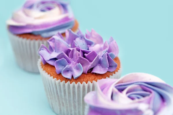 Sweet holiday buffet with vivid cupcakes — Stock Photo, Image