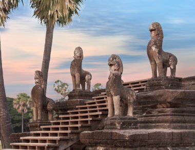 Angkor statues on the stairs, Cambodia