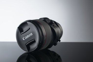 Photo lens close up on black background