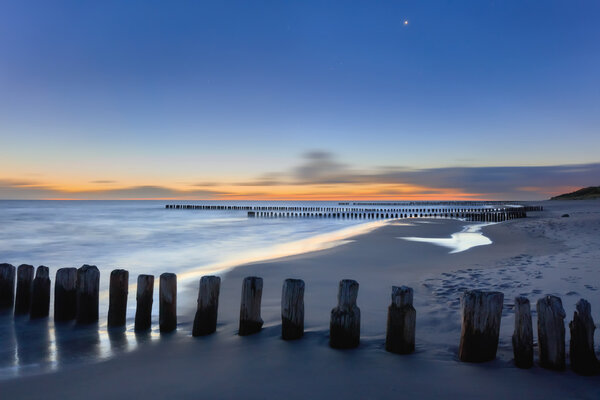 Dreamy blurred glowing sunset seascape