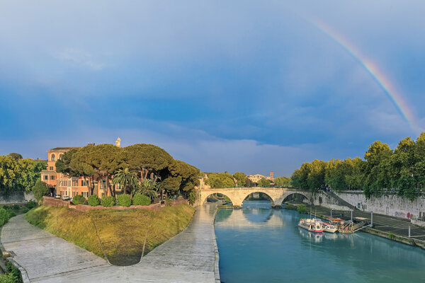 Tiber Island and Pons Cestius bridge in Rome