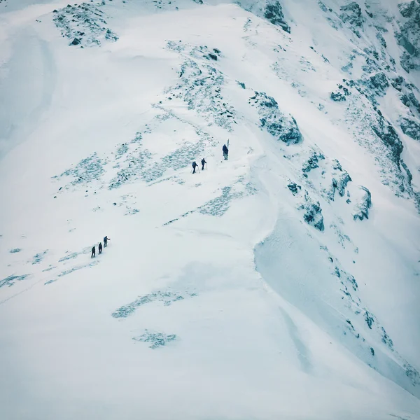 stock image Winter landscape of high snowy mountains