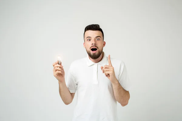 Young cool bearded man idea concept, happy young student coming up with an idea or solution. isolated on white — Stock Photo, Image