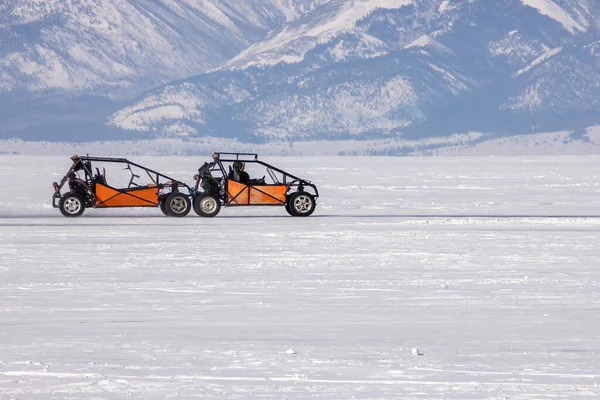 Opening of the Winter Season - Free open auto show - winter carting on the snow track. Karting in the winter.