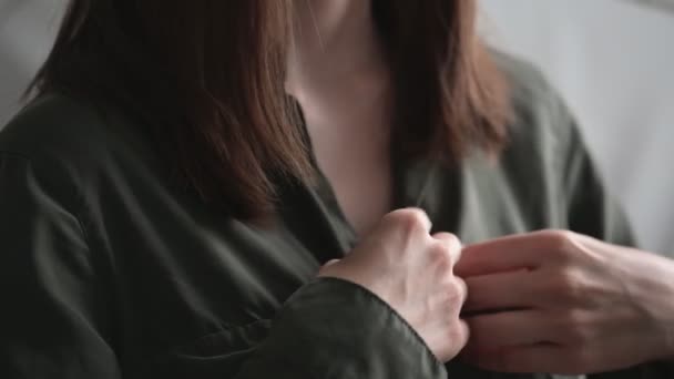 Lady Brunette Loose Flowing Hair Buttons Green Shirt Hands Standing — Stock Video