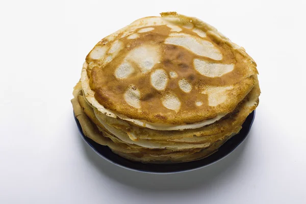 Pancakes on a plate on a white background — Stock Photo, Image