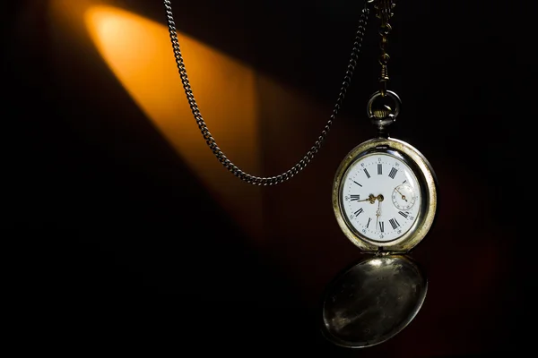 Antique silver pocket watch on a chain — Stock Photo, Image