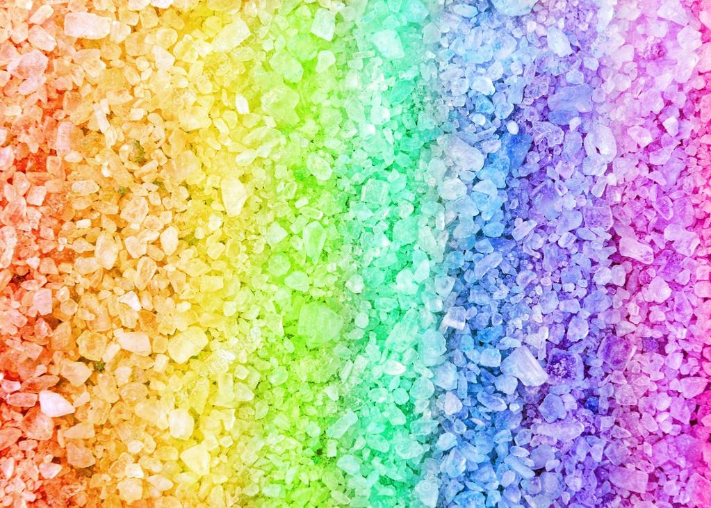 Rainbow spa bath salt crystals background texture Stock