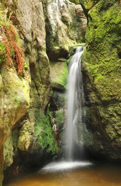 little waterfall in Skalne Mesto Adrspach Czech Republic clipart