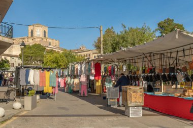 Sineu, Spain; april 14 2021: Weekly street market in the Majorcan town of Sineu in times of the de-escalation of the Coronavirus pandemic.