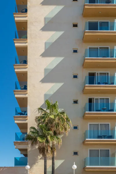 Hotel complex located on the island of Mallorca. Abstract effect of the shadows of the balconies projected on the facade