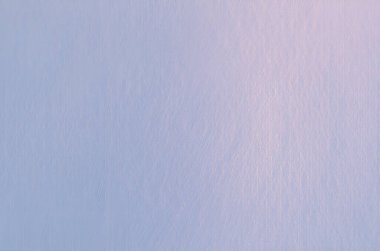 yumuşak pastel mavi ve pembe gradyan arkaplan ince desenli yüzey.