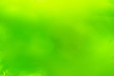 Açık yeşil ve koyu yeşil vignette ile soyut bulanık arkaplan