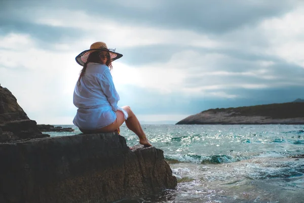 Beautiful Brunette Seen Sitting Rock Shores Adriatic Sea Cloudy Day — Stock Photo, Image