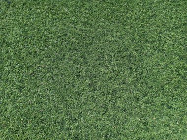 Bahçe olarak yeşil yapay çimlerin arkaplan veya dokusu.