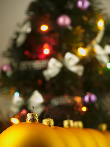 Big golden bauble Christmas Tree. — Stock Photo, Image