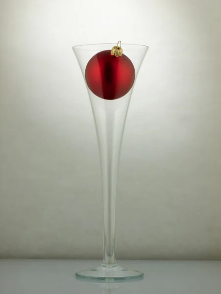 Christmas ball and champagne. — Stock Photo, Image