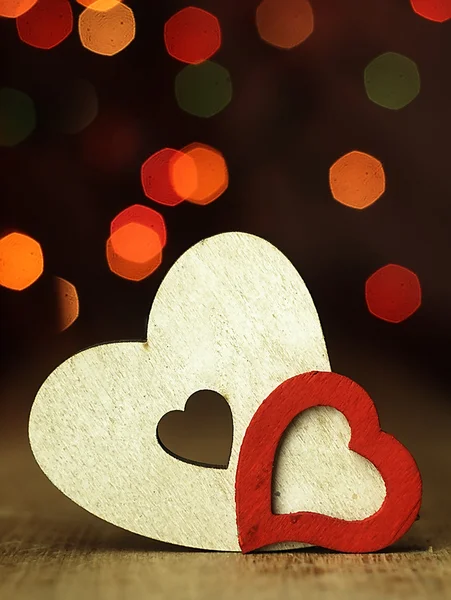 Hearts on a wooden boards background. — Stock Photo, Image