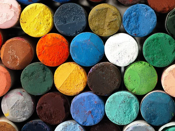 Colored dry pastel crayons closely. — Stock Photo, Image