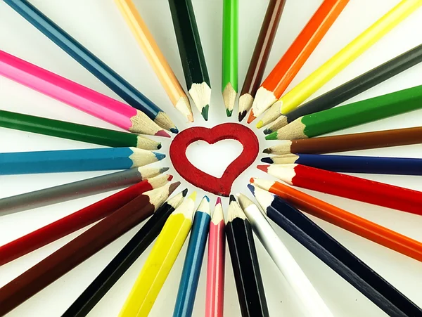 Colorful wooden crayons and red Heart. — Stock Photo, Image