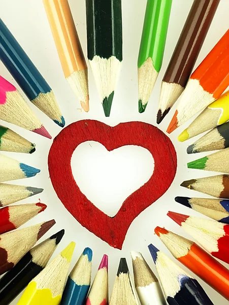 Colorful wooden crayons and red Heart. — Stock Photo, Image