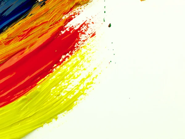 Rastros colorido cepillo en una hoja blanca de papel. —  Fotos de Stock