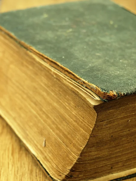 Old closed the book with a damaged cover. — Stock Photo, Image