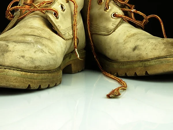 Pair of old, worn heavy boots. — Stock Photo, Image