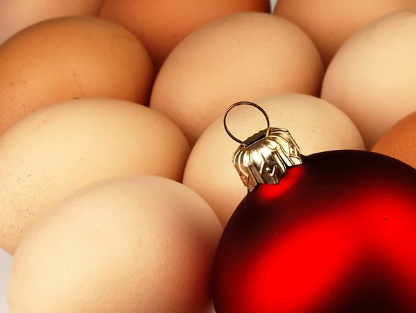 Christmas Tree bauble and Easter eggs. — Stock Photo, Image