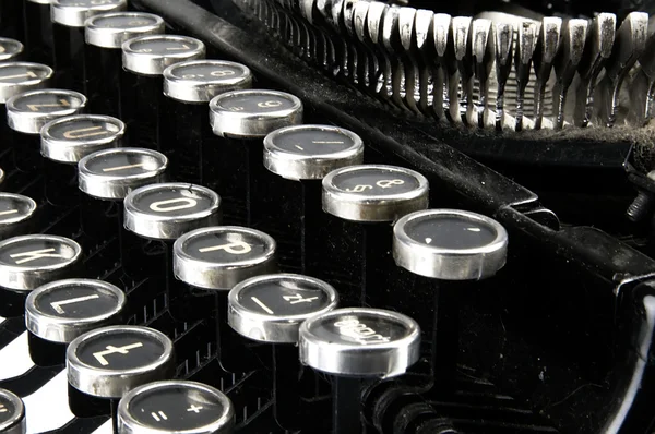 Stock image Old, dusty typewriter seen up close.