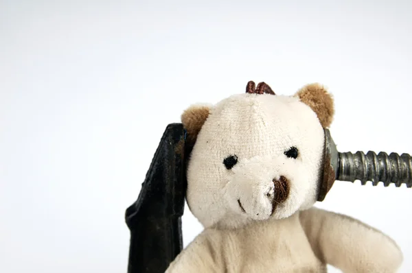 Clamp on the head teddy bear toy. — Stock Photo, Image