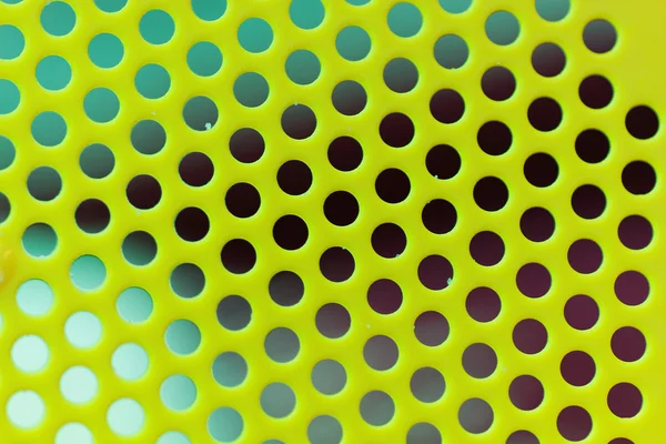 Delikli renkli yüzey.