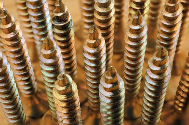 sarı çinko kaplama vidalar, soyut endüstriyel arka plan