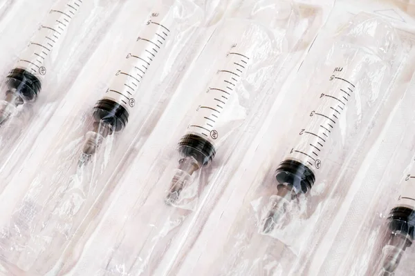 Closeup Plastic Disposable Syringes Blister Pack — Stock Photo, Image