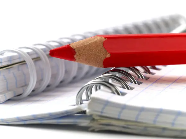 Red Pencil Spiral Notebooks Macro Stock Photo