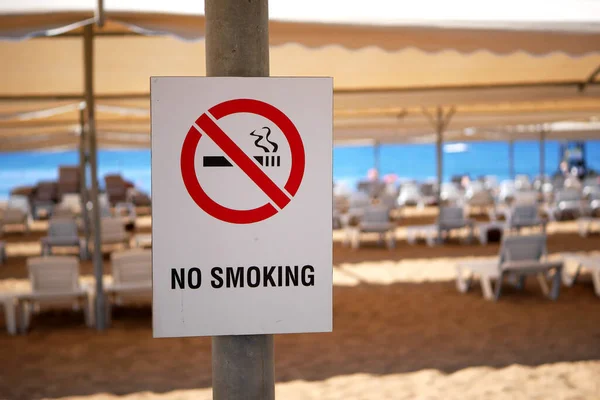 No smoking sign on the beach. Smoking is not allowed on the beach area.