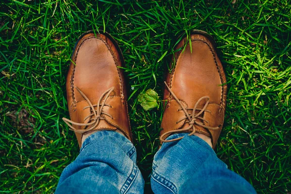 Man  shoes on the grass — Stock Photo, Image