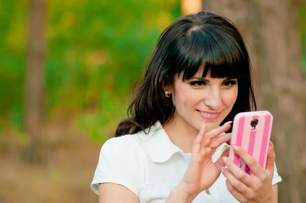 Happy woman phone talking. Face with toothy smile — Stock Photo, Image